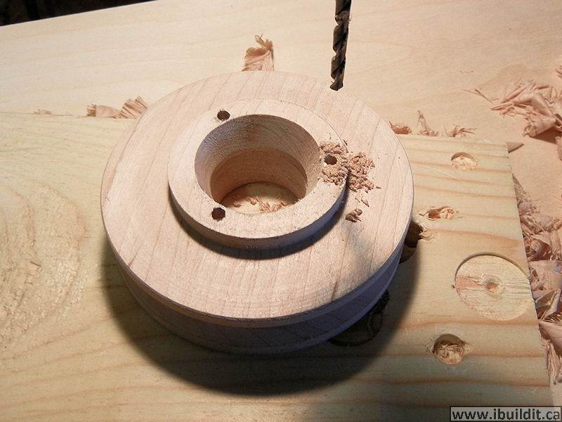 drill holes wooden pulley